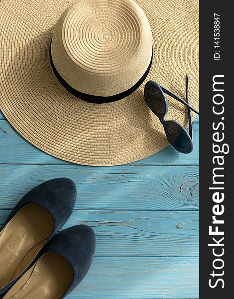 Women`s accessories - shoes, hat and sunglasses of blue color