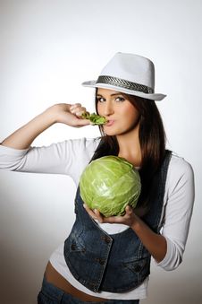 Young Pretty Woman With Green Cabbage Stock Photography Young Pretty Woman With Green Cabbage Stock Photography