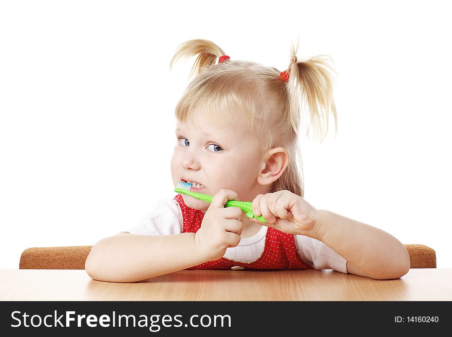 Child with toothbrush in hands