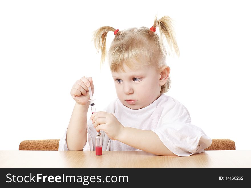 Child playing as a scientist with syringe. Child playing as a scientist with syringe