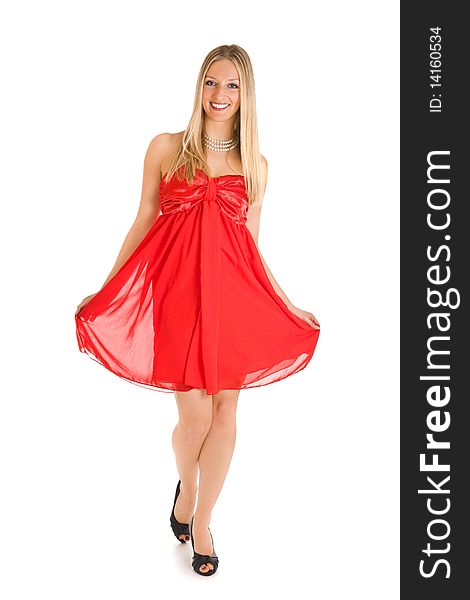 Isolated caucasian blond woman in red dress