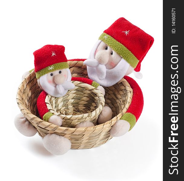 Red hat Santa Claus on cane basket