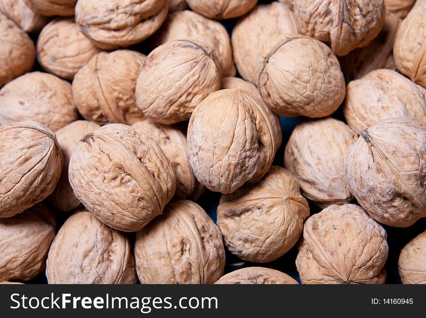 Dry brown different walnuts closeup