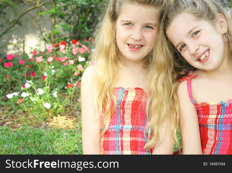 Shot of identical twin sisters together