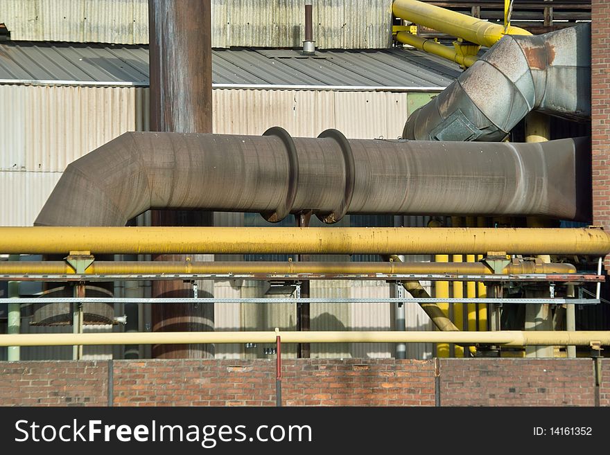 Part of the Heat and Gas Pipes of a modern Furnace to Produce Steel Old Furnace seen from below. Part of the Heat and Gas Pipes of a modern Furnace to Produce Steel Old Furnace seen from below