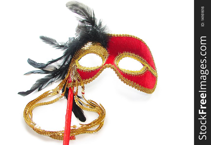 Red Carnival Mask with black feathers. Isolated on white