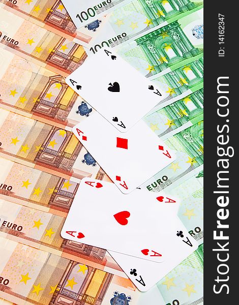 Four aces on top of Euro banknotes. Four aces on top of Euro banknotes.