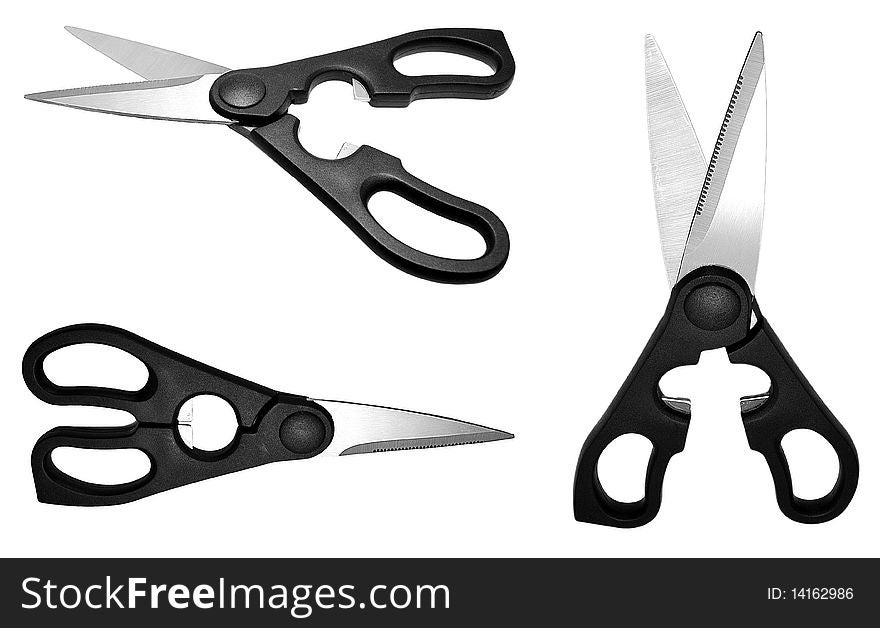 Steel scissors with the black plastic handle isolated on white background. Steel scissors with the black plastic handle isolated on white background