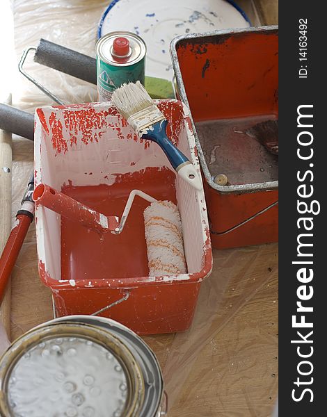 Bucket a, paintbrush and other tools for whitewash