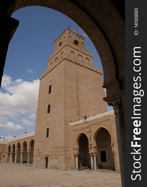 High tower from a court yard of the Great mosque in Kairuan in Tunisia in Africa