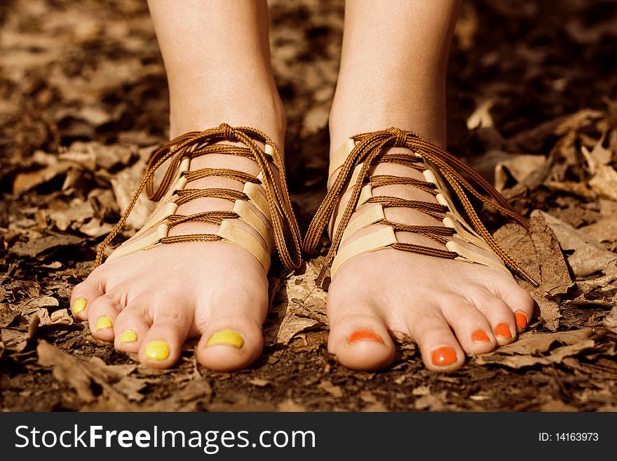 Barefooted tender woman's feet. Shoes concept