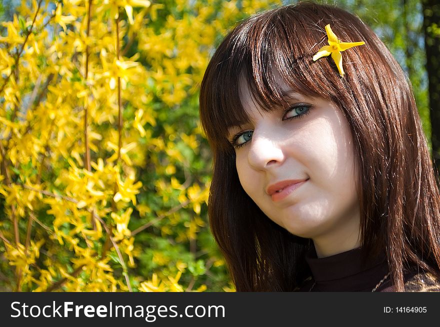 Beautiful girl with spring flower in hair. Beautiful girl with spring flower in hair
