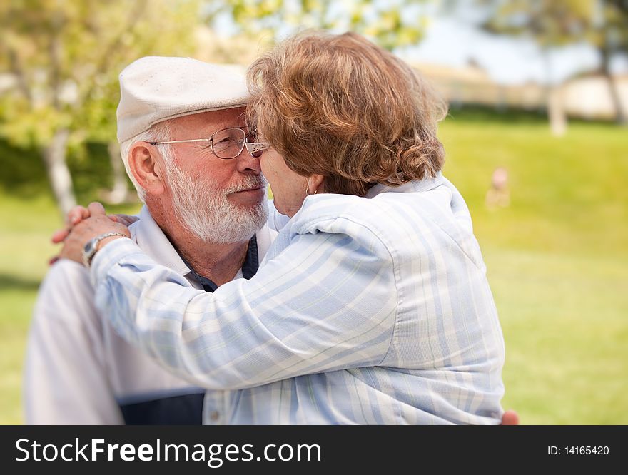 Happy Senior Couple In The Park