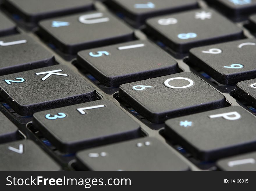 A macro shot of a notebook keyboard. A macro shot of a notebook keyboard