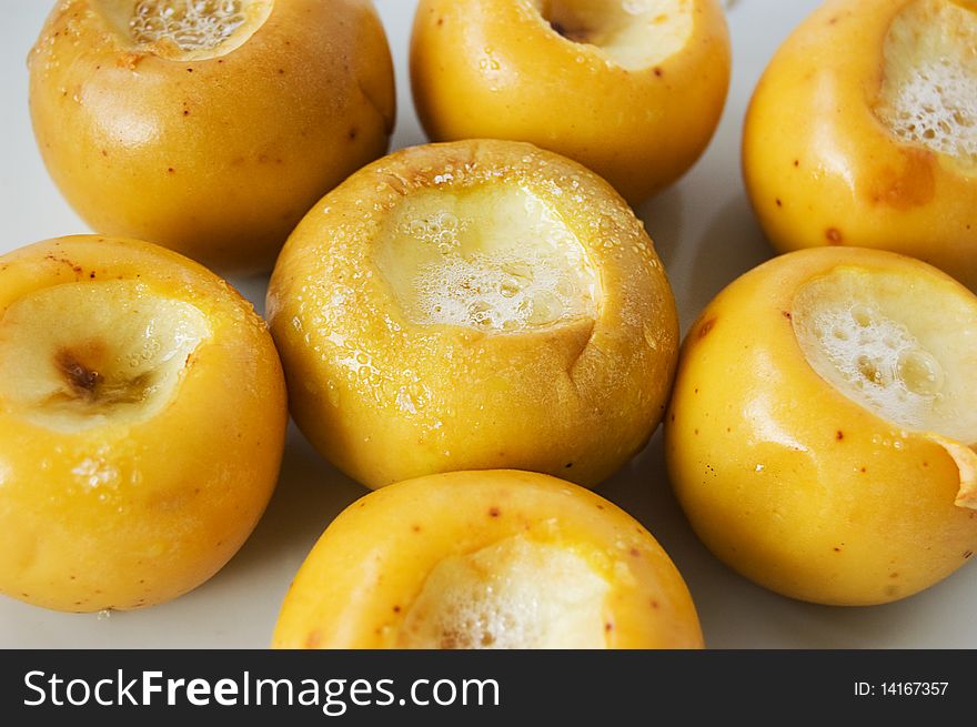 Some baked apples on plate