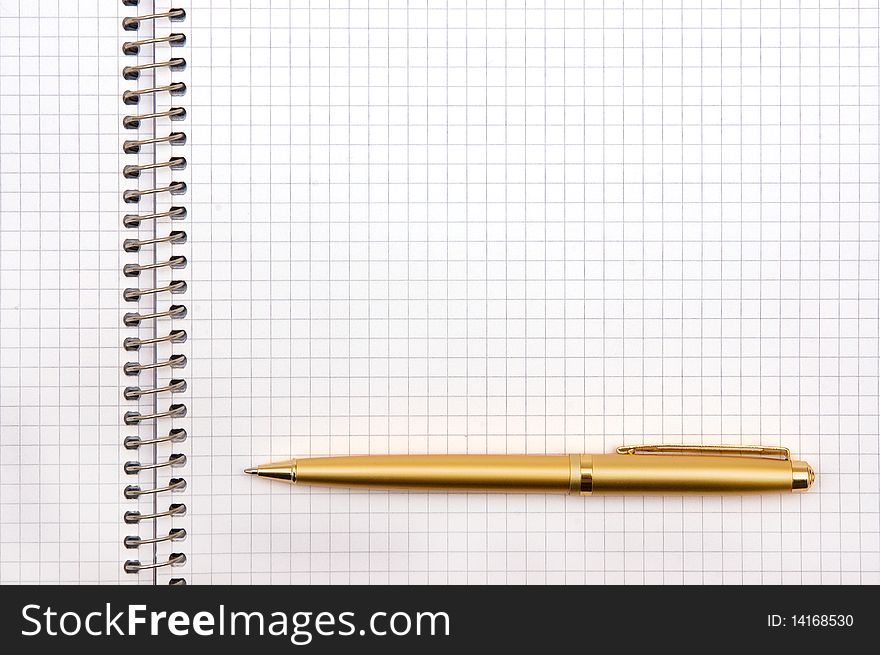 The image of the notepad and pen