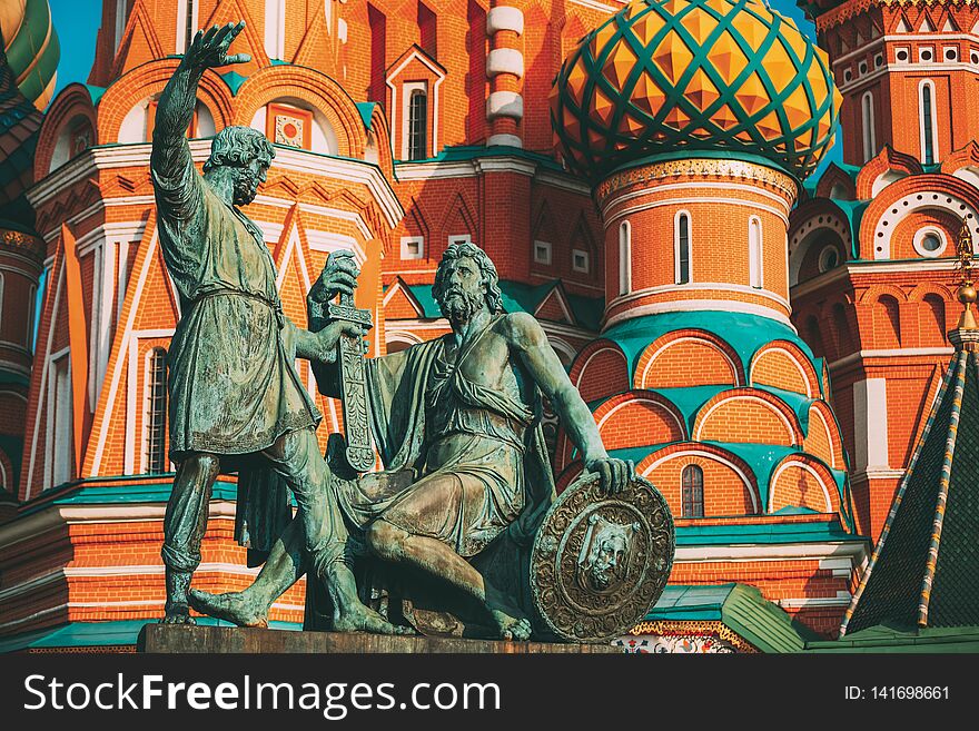 Monument to Minin and Pozharsky on the background of the Saint Basil`s Cathedral in Red Square in Moscow, Russia. Monument to Minin and Pozharsky on the background of the Saint Basil`s Cathedral in Red Square in Moscow, Russia.