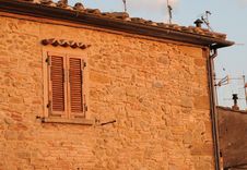 Italian House With Antennas In The Evening Sun Royalty Free Stock Image