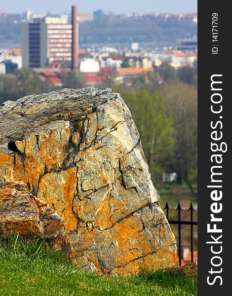 Colorful stone with the background of city