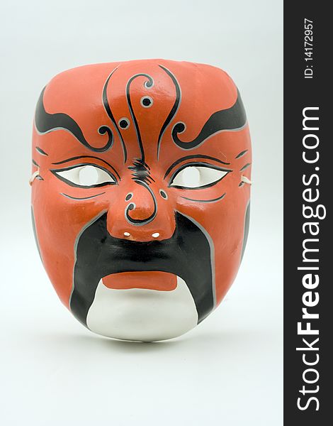 A red chinese opera mask from singapore. A red chinese opera mask from singapore.