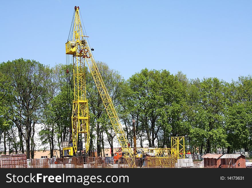 Lifting crane on a construction site