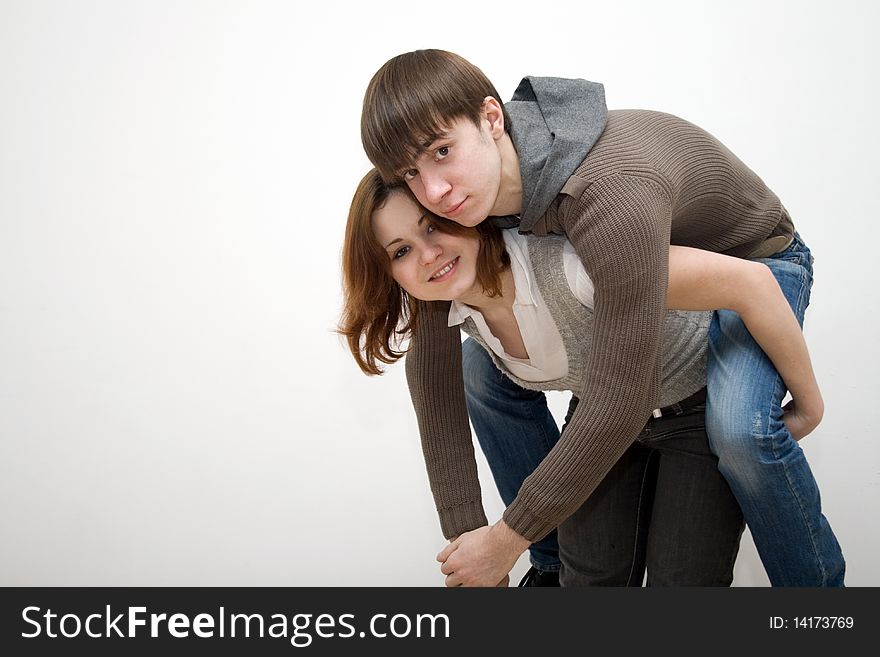 Girl giving a pig back