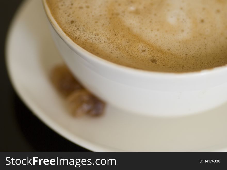 Close up shot of cappuccino cup, shallow depth of field. Close up shot of cappuccino cup, shallow depth of field