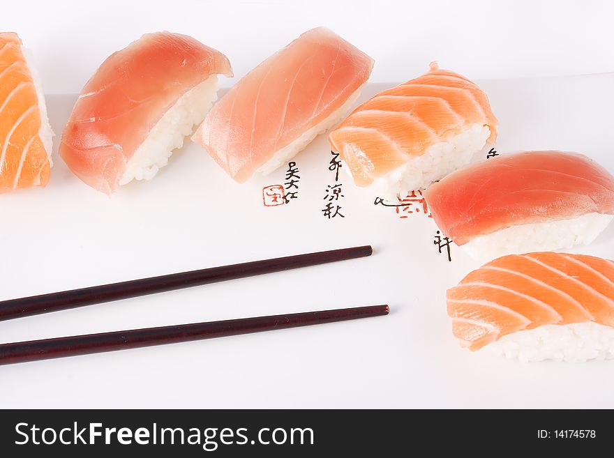 Salmon And Tuna Sushi With Chopsticks