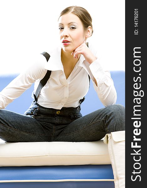 Sitting young businesswoman on sofa. Sitting young businesswoman on sofa
