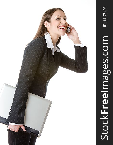 Portrait of telephoning young businesswoman