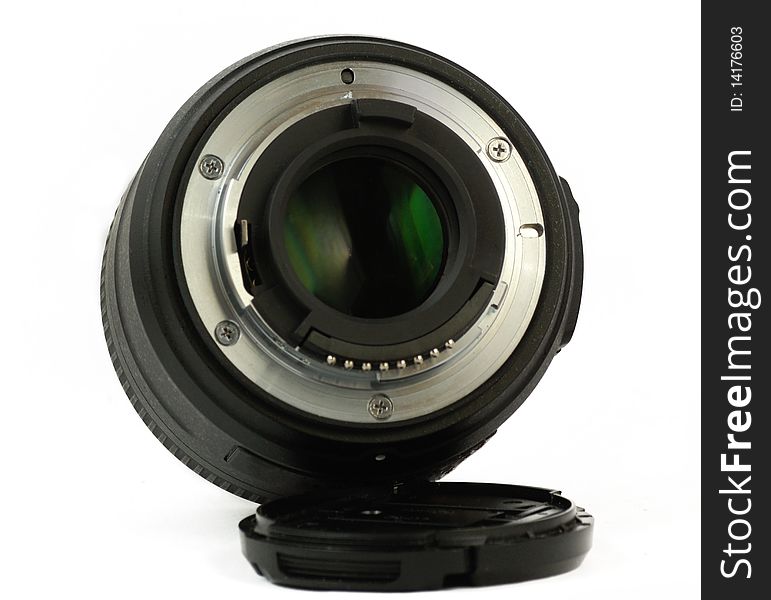 A 35mm prime dslr lens in detail isolated on white background rear view. A 35mm prime dslr lens in detail isolated on white background rear view