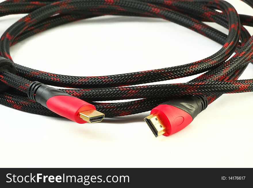 A HDMI Cable isolated on white background, detail on the connectors. A HDMI Cable isolated on white background, detail on the connectors