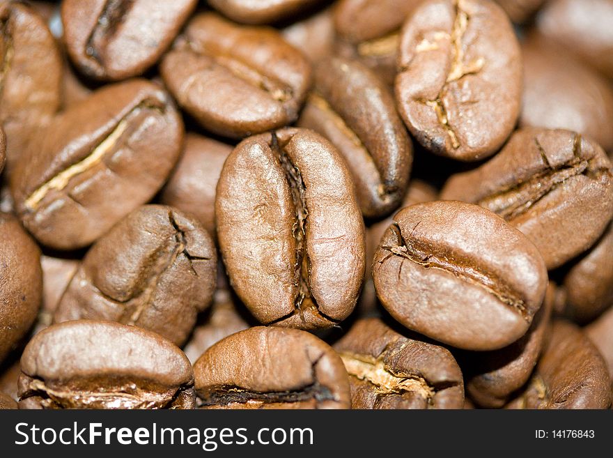 Many zoomed coffee beans in the picture
