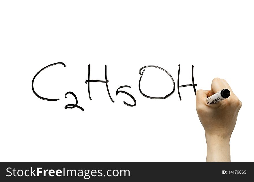 Hand writing the chemical formula on a whiteboard with a mark pen