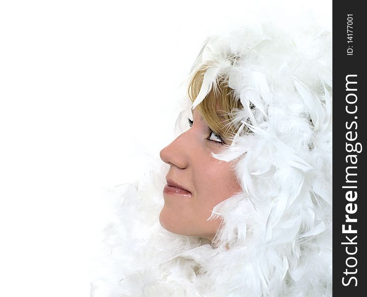 Profile Portrait of a girl with white feathers on white