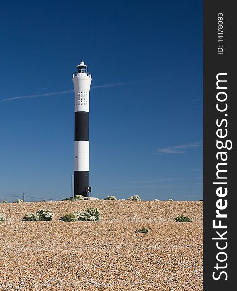 Lighthouse against a blue sky