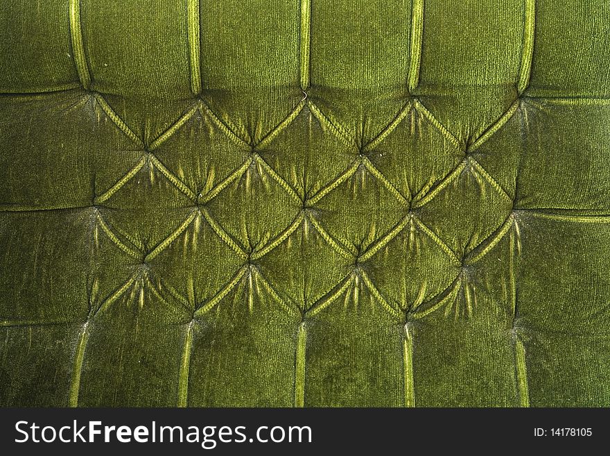Armchair green texture, details of an old material with dust all over it. Armchair green texture, details of an old material with dust all over it.