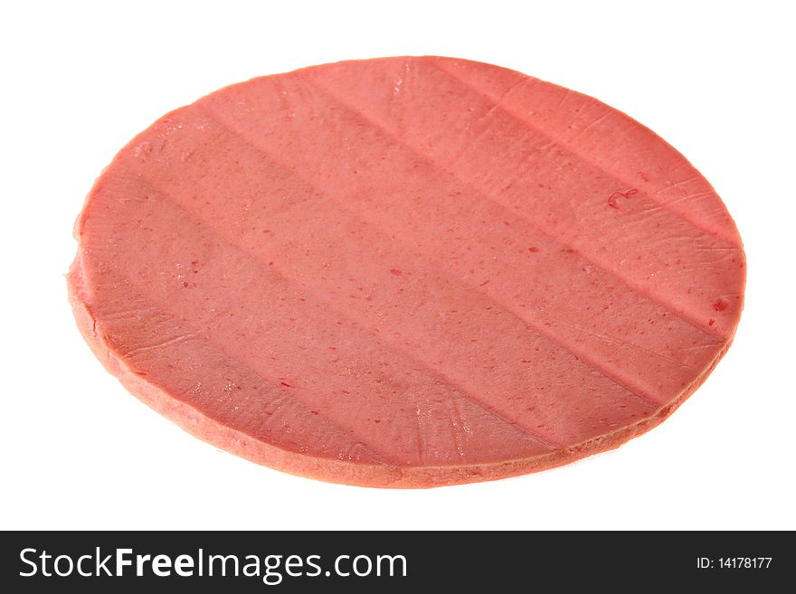 Round slice of sausage on a white background.