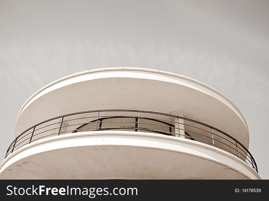 Round white building and sky. Round white building and sky