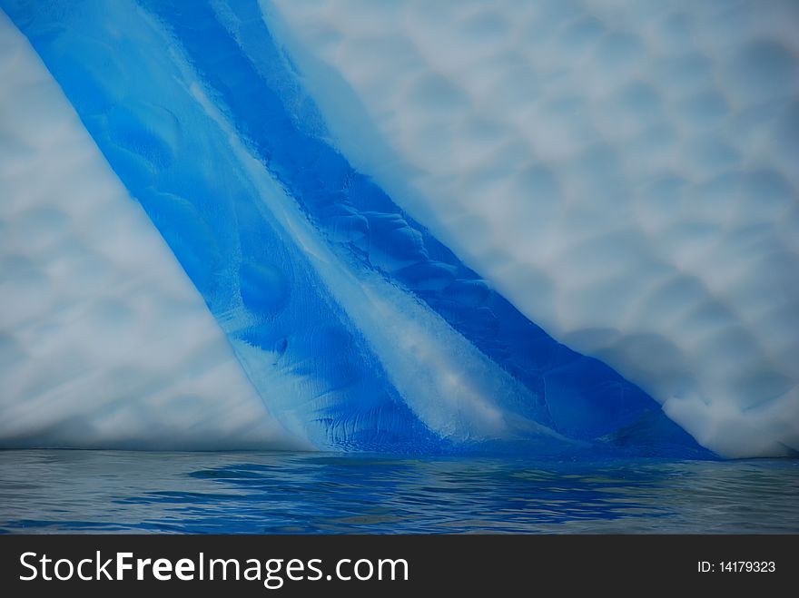 Detail of blue streak in an iceberg. Detail of blue streak in an iceberg