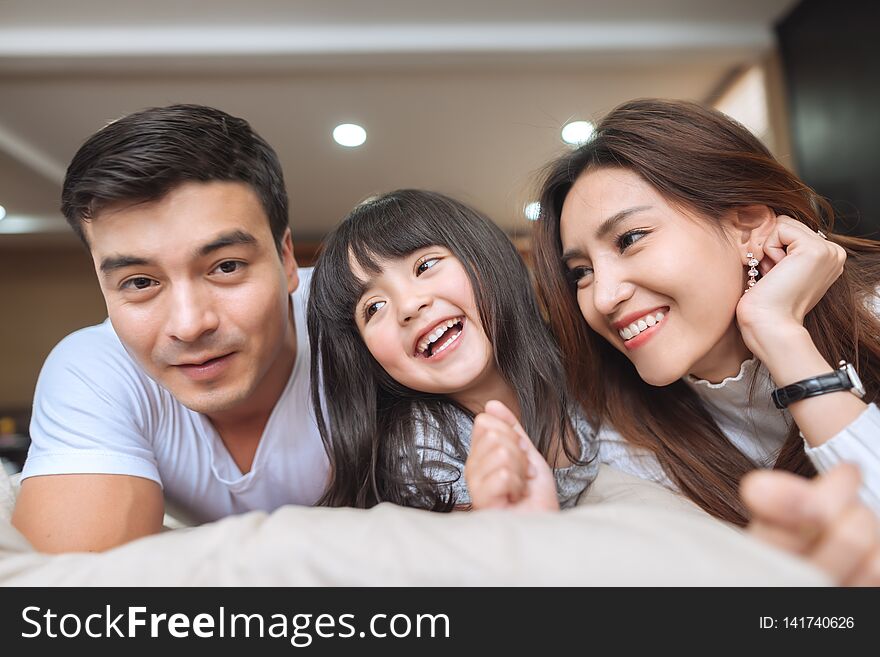 Portrait Happy Asian Family at home