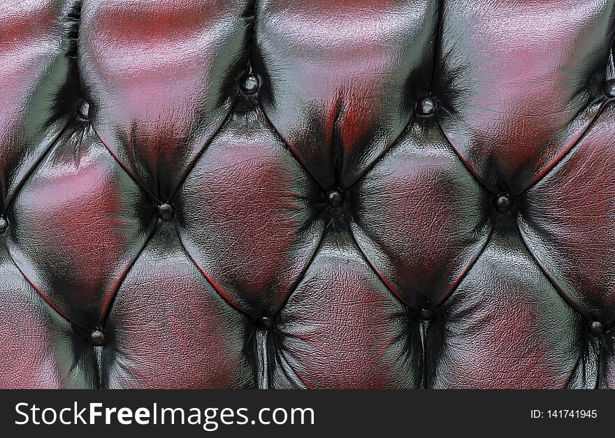 Upholstery leather sofa, made by the by coupler method.