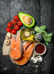 Healthy Food. Salmon Steaks With Vegetables, Herbs And Spices Royalty Free Stock Images