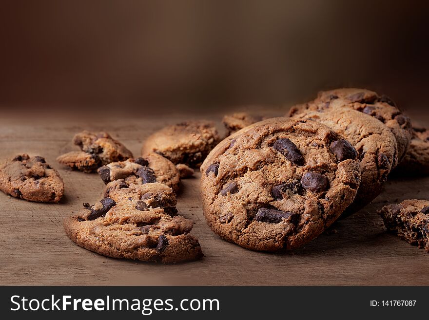Chocolate chip cookies on wooden Background, copyspace, top view