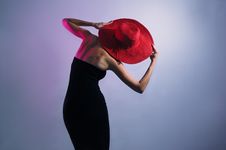 Leaning Stylish Lady Wearing Dress And Hat Royalty Free Stock Image Leaning Stylish Lady Wearing Dress And Hat Royalty Free Stock Image