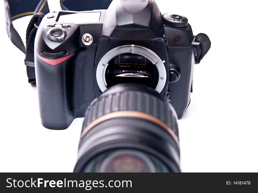 Modern digital camera equipped with zoom lens isolated on white background. Modern digital camera equipped with zoom lens isolated on white background