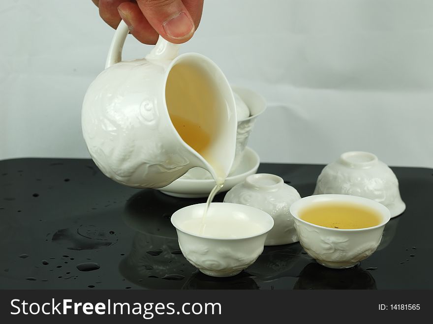 They are chinese teapot and teacup for Kungfu tea.Kongfu tea is kind of particular stlye of drinking tea,it's also a kind of tea-culture. They are chinese teapot and teacup for Kungfu tea.Kongfu tea is kind of particular stlye of drinking tea,it's also a kind of tea-culture.