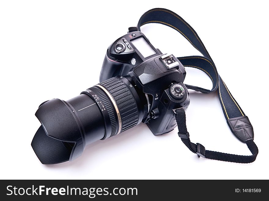 Camera equipped with zoom lens isolated on white