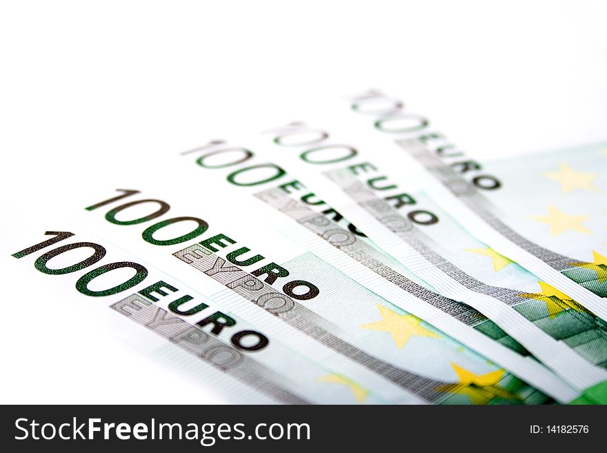 Five euro banknotes closeup on white