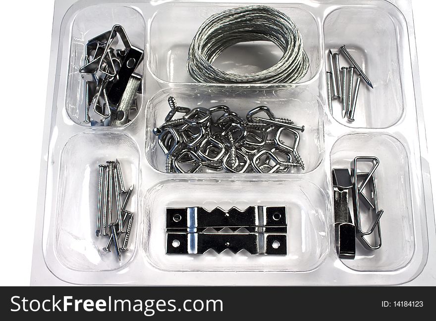 Assorted hardware to hang pictures in a clear pastic package. Assorted hardware to hang pictures in a clear pastic package